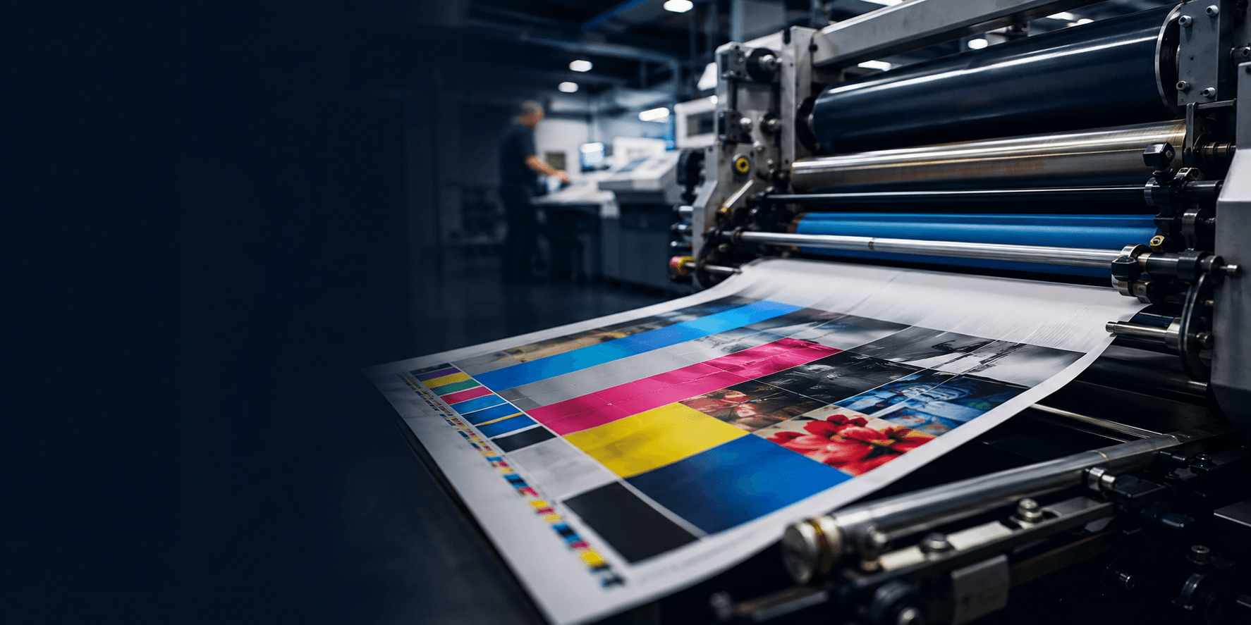 Metal rollers and a colour sheet on a printing press